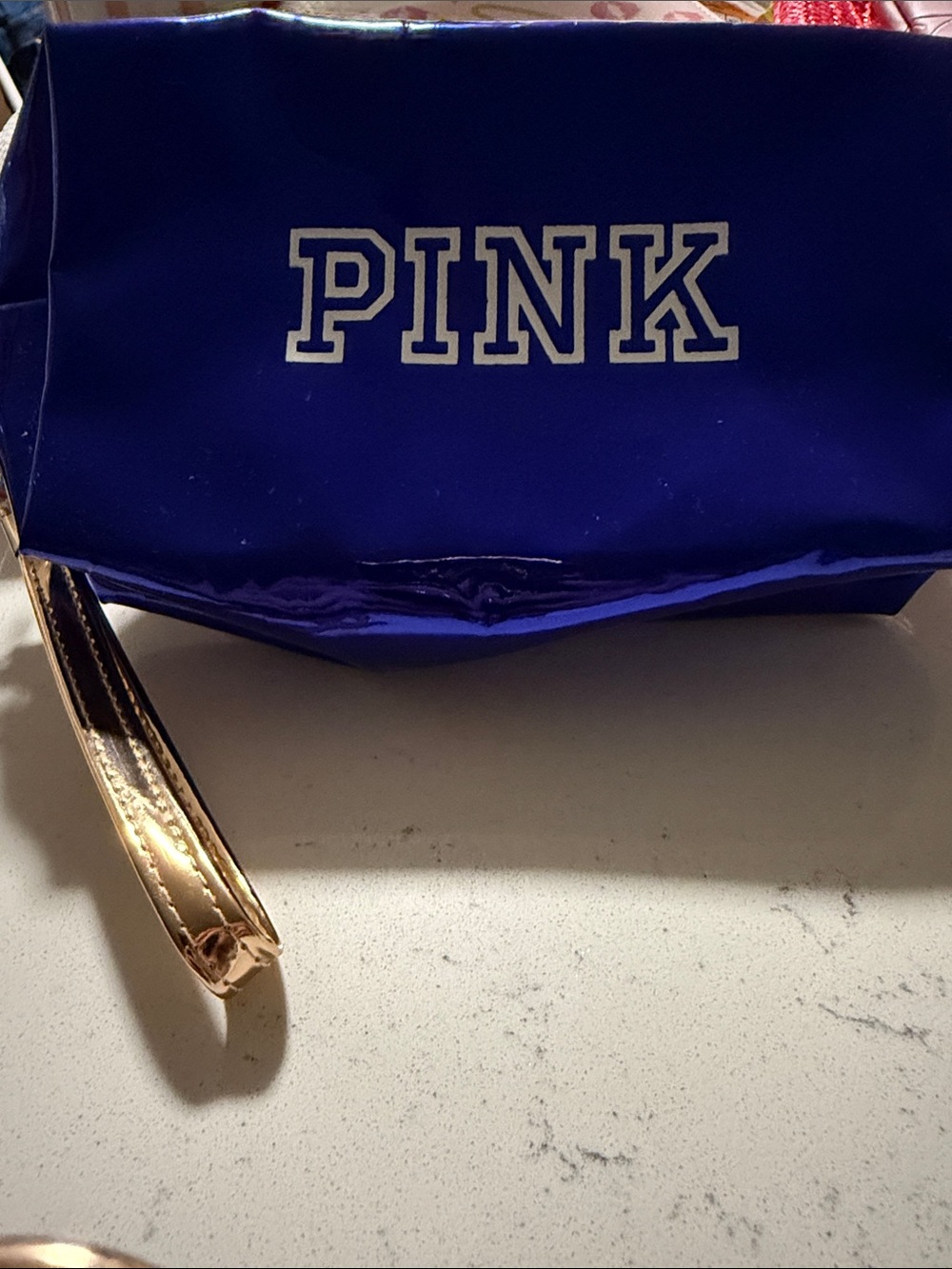 PINK Victoria's Secret Shiny Royal Blue Wristlet with Gold Strap. Dorm essential